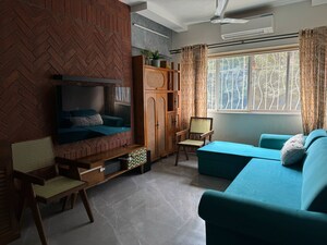 Living Room in 2 BHK Apartment at Sarla CHS, Andheri West – for Sale