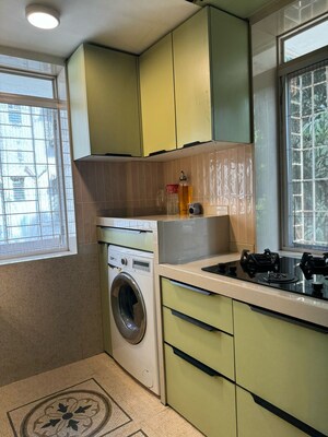 Kitchen in 2 BHK Apartment at Sarla CHS, Andheri West – for Sale