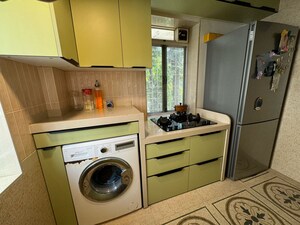 Kitchen in 2 BHK Apartment at Sarla CHS, Andheri West – for Sale