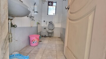 Bathroom in 2 BHK Apartment at Vikas Park CHS, Malad West – for Sale