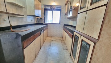 Kitchen in 2 BHK Apartment at Vikas Park CHS, Malad West – for Sale
