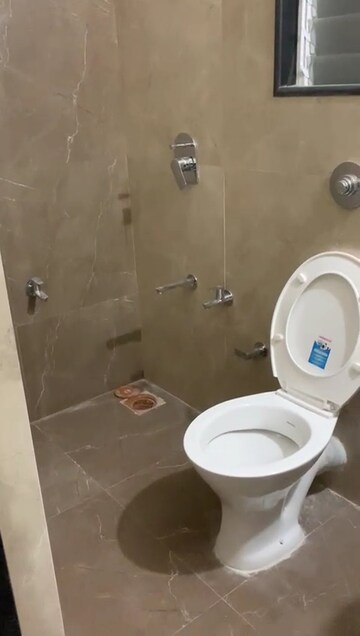 Bathroom in 1 BHK Apartment at Vihang Valley Phase 3, Kasarvadavali – for Rent