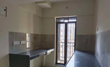 Kitchen in 2 BHK Apartment at Rustomjee Avenue L1, Virar West – for Rent