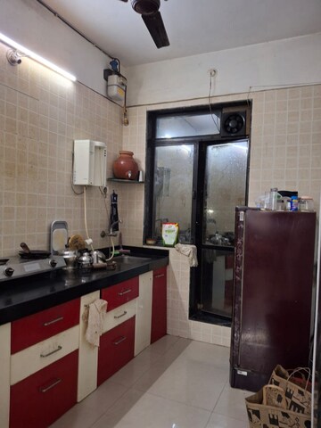 Kitchen in 1 BHK Apartment at Shree Ganesh Darshan, Kopar Khairane – for Rent