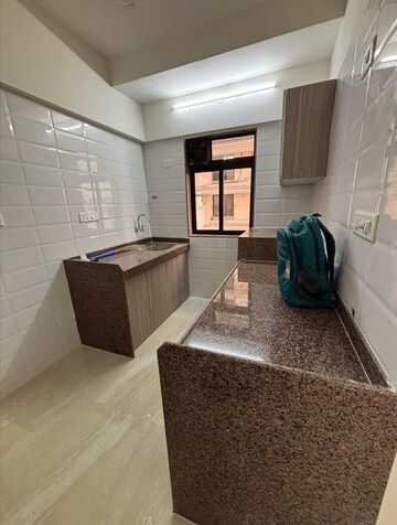 Kitchen in 1.5 BHK Apartment at Chandiwala Pearl Heaven, Andheri East – for Rent