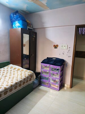 Master Bedroom in 2 BHK Apartment at Shubharambh Complex, Manpada – for Sale