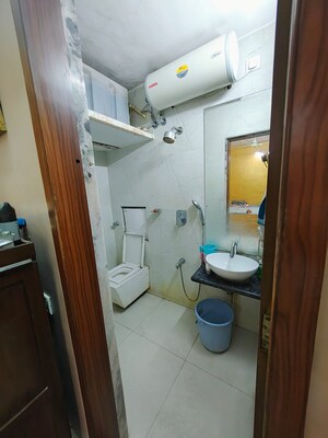 Bathroom in 2 BHK Apartment at Shubharambh Complex, Manpada – for Sale