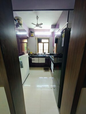 Kitchen in 2 BHK Apartment at Shubharambh Complex, Manpada – for Sale