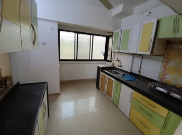 Kitchen in 3 BHK Apartment at Soham Garden, Manpada – for Sale