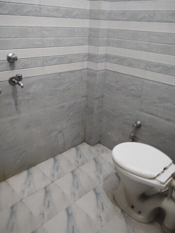 Bathroom in 3 BHK Apartment at Jankipuram – for Rent