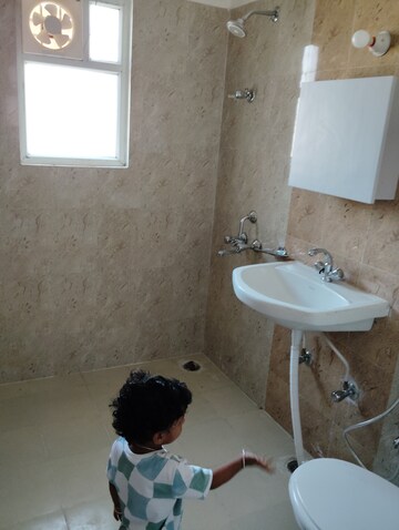 Bathroom in 3 BHK Apartment at Jankipuram – for Rent