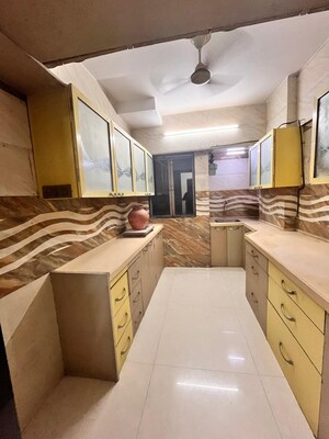 Kitchen in 3 BHK Apartment at Shiv Sai Paradise, Majiwada – for Sale