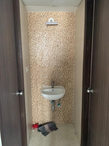 Bathroom in 1 BHK Apartment at Lodha Palava City Lakeshore Greens, Dombivli East – for Rent