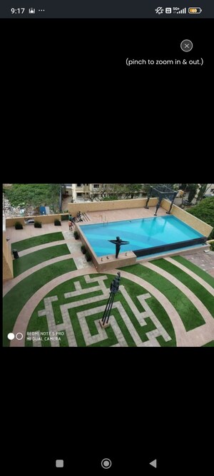 Swimming Pool in 2 BHK Apartment at Nirman Kutir, Yari Road – for Sale