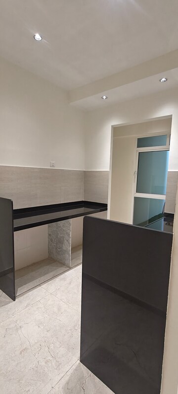 Kitchen in 2 BHK Apartment at Sunbeam Heights, Andheri West – for Sale