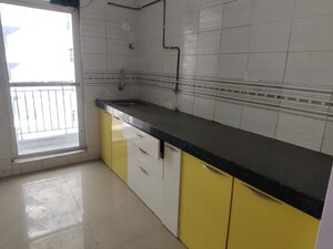 Kitchen in 2 BHK Apartment at Tanvi Eminence Phase II, Mira Road – for Sale
