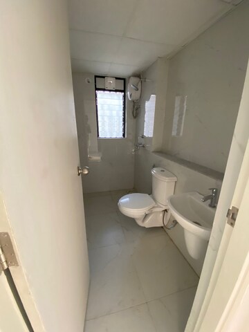Bathroom in 3 BHK Apartment at Runwal Gardens Phase 2, Dombivli East – for Rent
