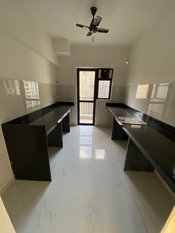 Kitchen in 3 BHK Apartment at Runwal Gardens Phase 2, Dombivli East – for Rent