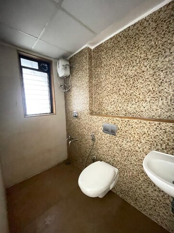 Bathroom in 1 BHK Apartment at Lodha Palava Downtown, Dombivli East – for Rent