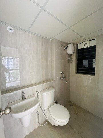 Bathroom in 2 BHK Apartment at Runwal Gardens, Dombivli East – for Rent