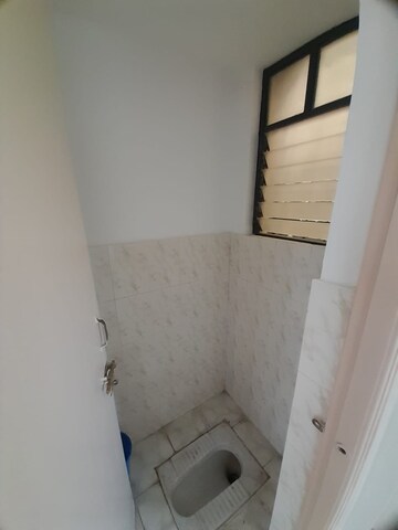 Bathroom in 2 BHK Apartment at Om Avishkar, Rambaug Colony – for Rent