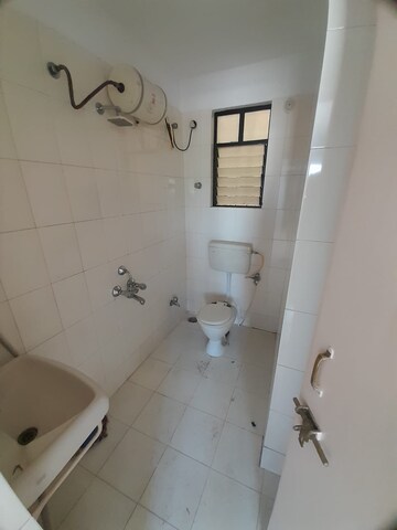 Bathroom in 2 BHK Apartment at Om Avishkar, Rambaug Colony – for Rent