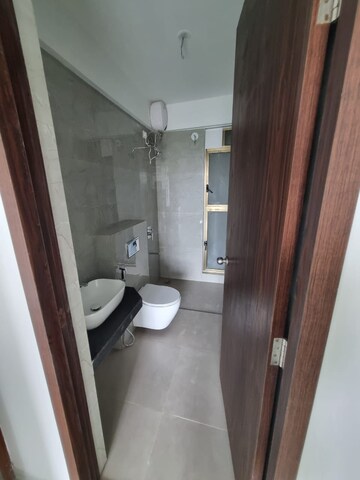 Bathroom in 2 BHK Apartment at Raymond Ten X Habitat, Pokhran Road No 2 – for Rent