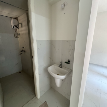 Attached Bathroom in 1 BHK Apartment at Runwal Gardens, Dombivli East – for Rent
