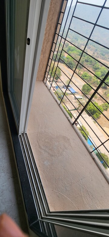Balcony in 1 BHK Apartment at Mahavir Kalpavruksha, Ghodbunder Road – for Sale