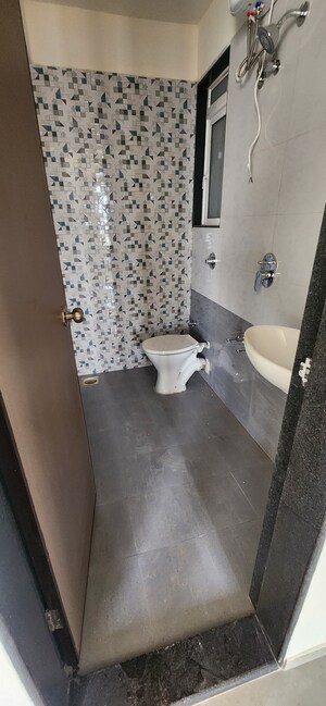 Bathroom in 1 BHK Apartment at Mahavir Kalpavruksha, Ghodbunder Road – for Sale