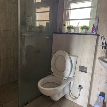 Bathroom in 2 BHK Apartment at Prestige Sunrise Park Brichwood, Gollahalli – for Rent