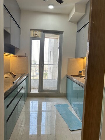 Kitchen in 2 BHK Apartment at Piramal Vaikunth, Balkum Pada – for Rent