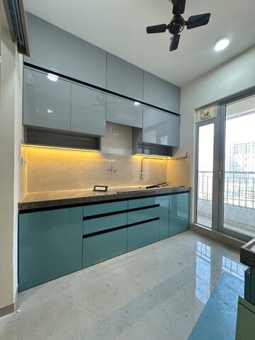 Kitchen in 2 BHK Apartment at Piramal Vaikunth, Balkum Pada – for Rent