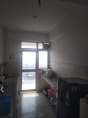 Kitchen in 2 BHK Apartment at GH-7 Crossings Republik, Vijay Nagar – for Rent