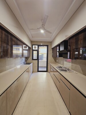 Kitchen in 4 BHK Builder Floor at Auram Floor, South City 2 – for Sale