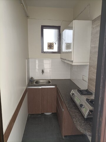 Kitchen in 1 RK Builder Floor at DLF Pink Town House, Dlf City Phase 3 – for Rent