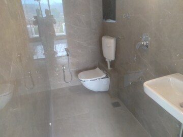 Bathroom in 1 BHK Apartment at Om Ved Heights, Shirgaon – for Sale
