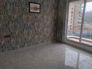 Master Bedroom in 2 BHK Apartment at Om Ved Heights, Shirgaon – for Sale