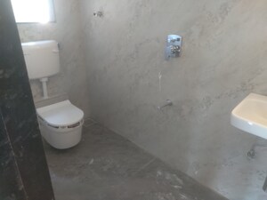 Bathroom in 2 BHK Apartment at Om Ved Heights, Shirgaon – for Sale