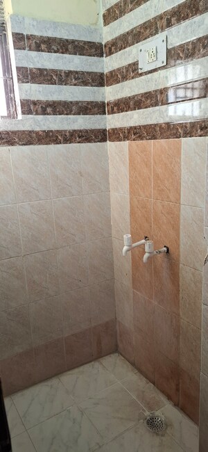 Bathroom in 1.5 BHK Apartment at Sector 10 Greater Noida – for Sale