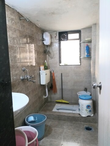 Bathroom in 2 BHK Apartment at Nakshatra CHS Vasai West, Vasai West – for Sale