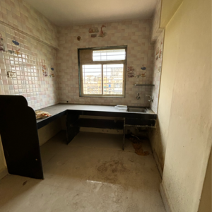 Kitchen in 2 BHK Apartment at Umadeep Society, Titwala – for Sale