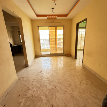 Living Room in 2 BHK Apartment at Umadeep Society, Titwala – for Sale