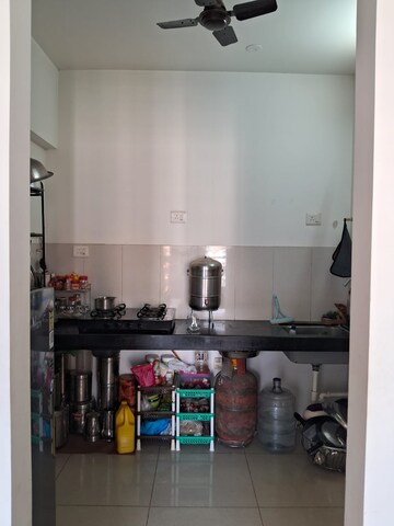 Kitchen in 1.5 BHK Apartment at Dosti West County, Balkum Pada – for Rent
