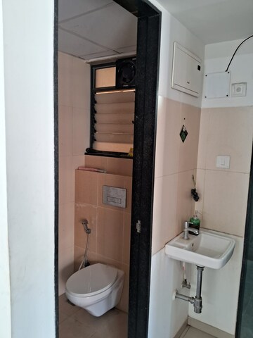 Bathroom in 1.5 BHK Apartment at Dosti West County, Balkum Pada – for Rent
