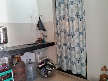 Kitchen in 1.5 BHK Apartment at Dosti West County, Balkum Pada – for Rent