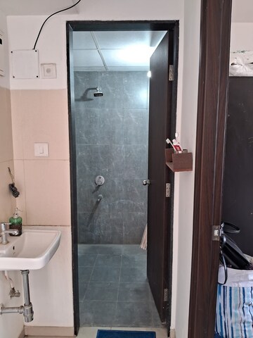 Bathroom in 1.5 BHK Apartment at Dosti West County, Balkum Pada – for Rent