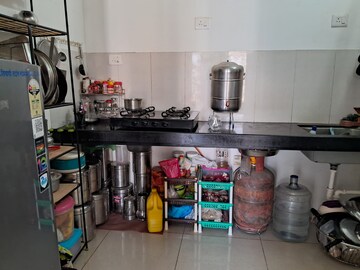 Kitchen in 1.5 BHK Apartment at Dosti West County, Balkum Pada – for Rent