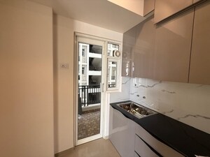 Kitchen in 2 BHK Apartment at Shalimar Mannat, Faizabad Road – for Sale