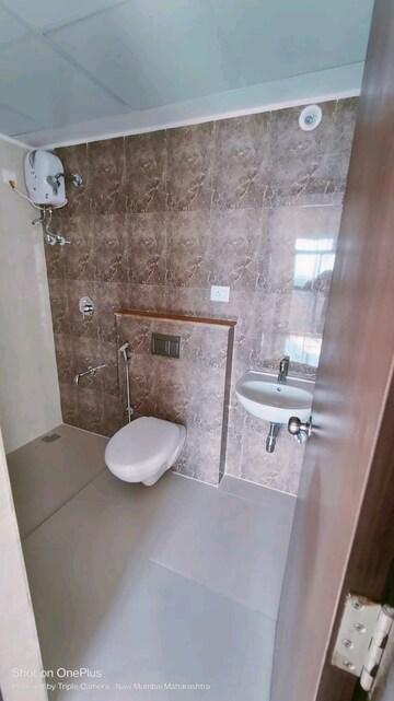 Bathroom in 1 BHK Apartment at Lodha Palava Downtown, Dombivli East – for Sale
